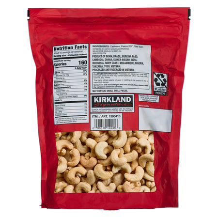 Red package of Kirkland cashews with nutrition label and branding.