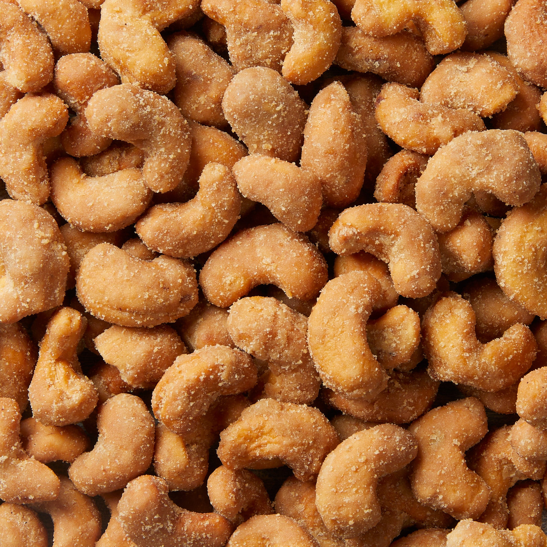 Close-up of a pile of sugared cashews