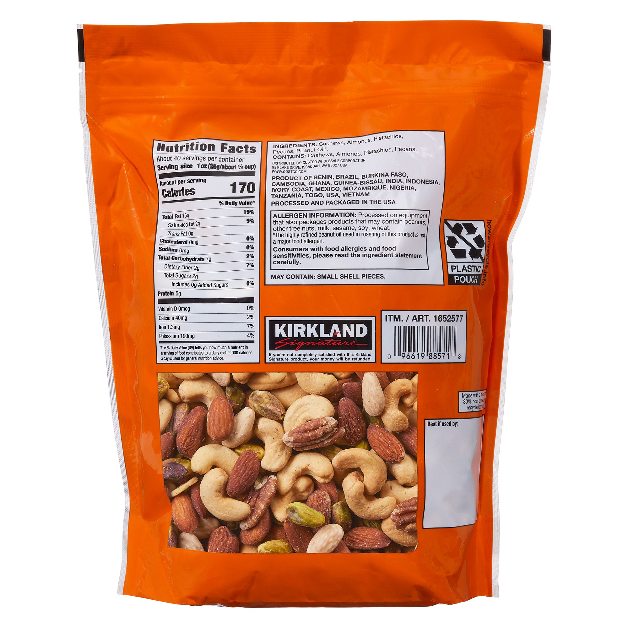 Kirkland Signature mixed nuts package with nutrition label on an orange background