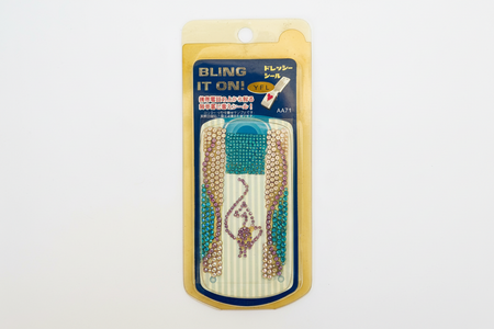 Packaged hair accessories with 'Bling It On!' branding on a white background