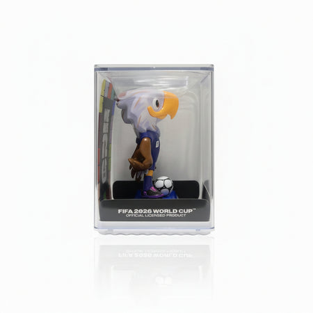 FIFA 2022 World Cup bobblehead figure in packaging held by a hand against a white background