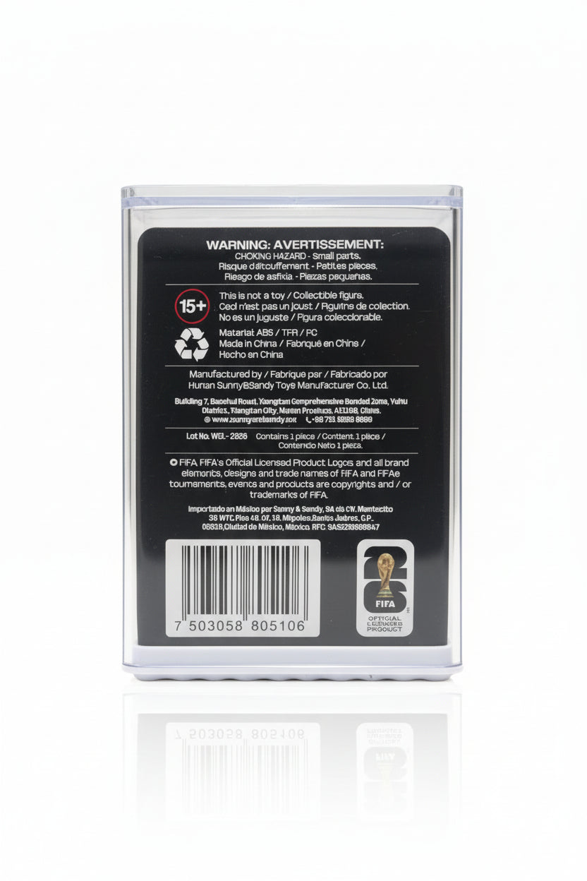Back of a toy packaging with warning label and barcode held by a hand.