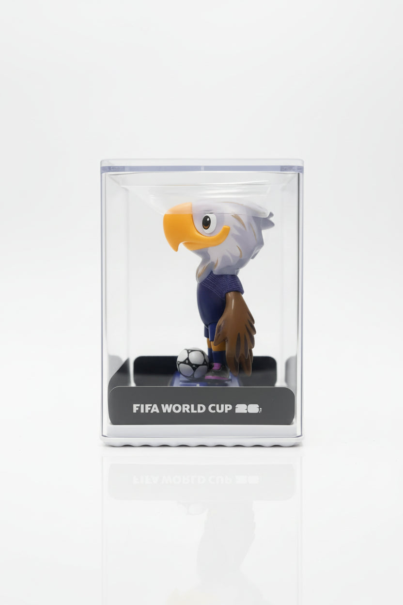 FIFA World Cup bobblehead figure in packaging held by a hand against a white background