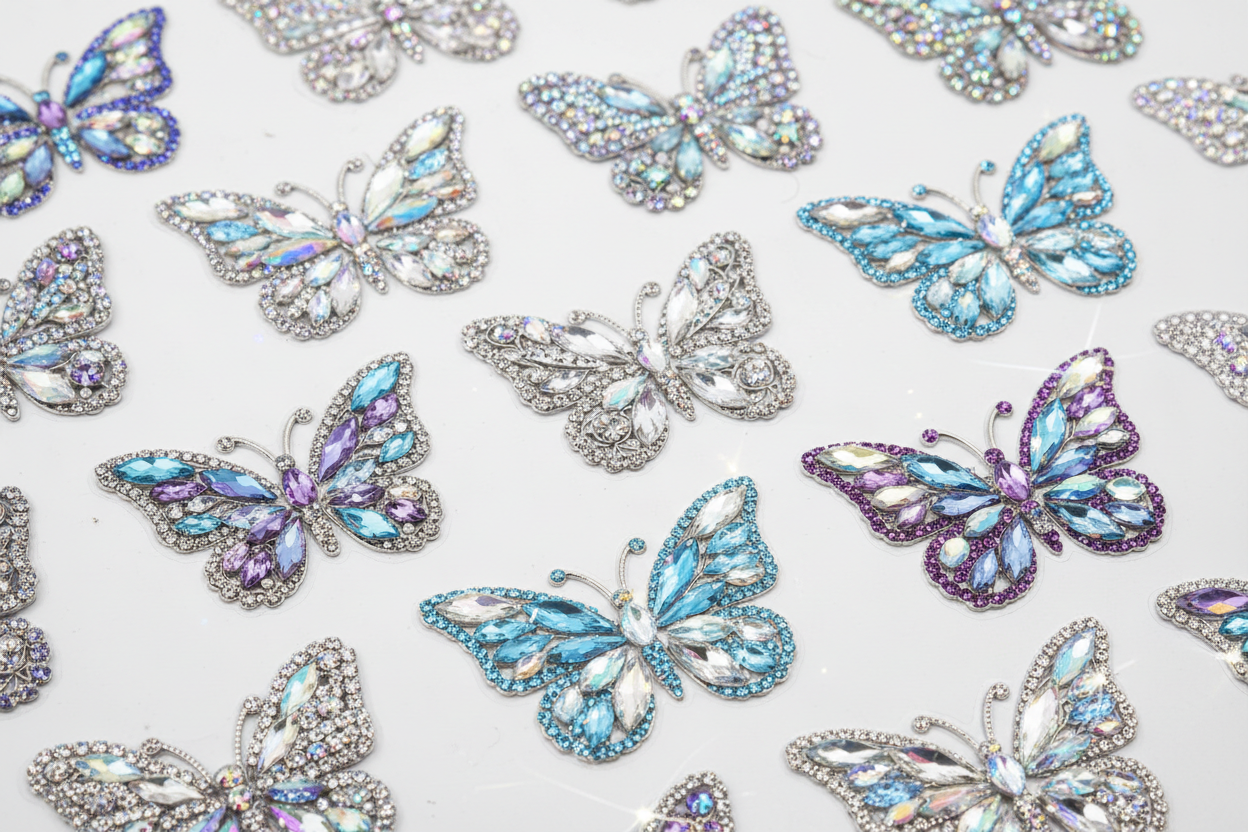 Close-up of butterfly rhinestone bling stickers showing individual sparkling gems