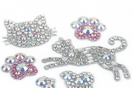 Close-up of cat rhinestone bling stickers showing individual sparkling gems