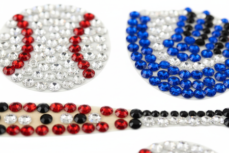 Close-up of baseball themed rhinestone bling stickers showing individual crystal gems